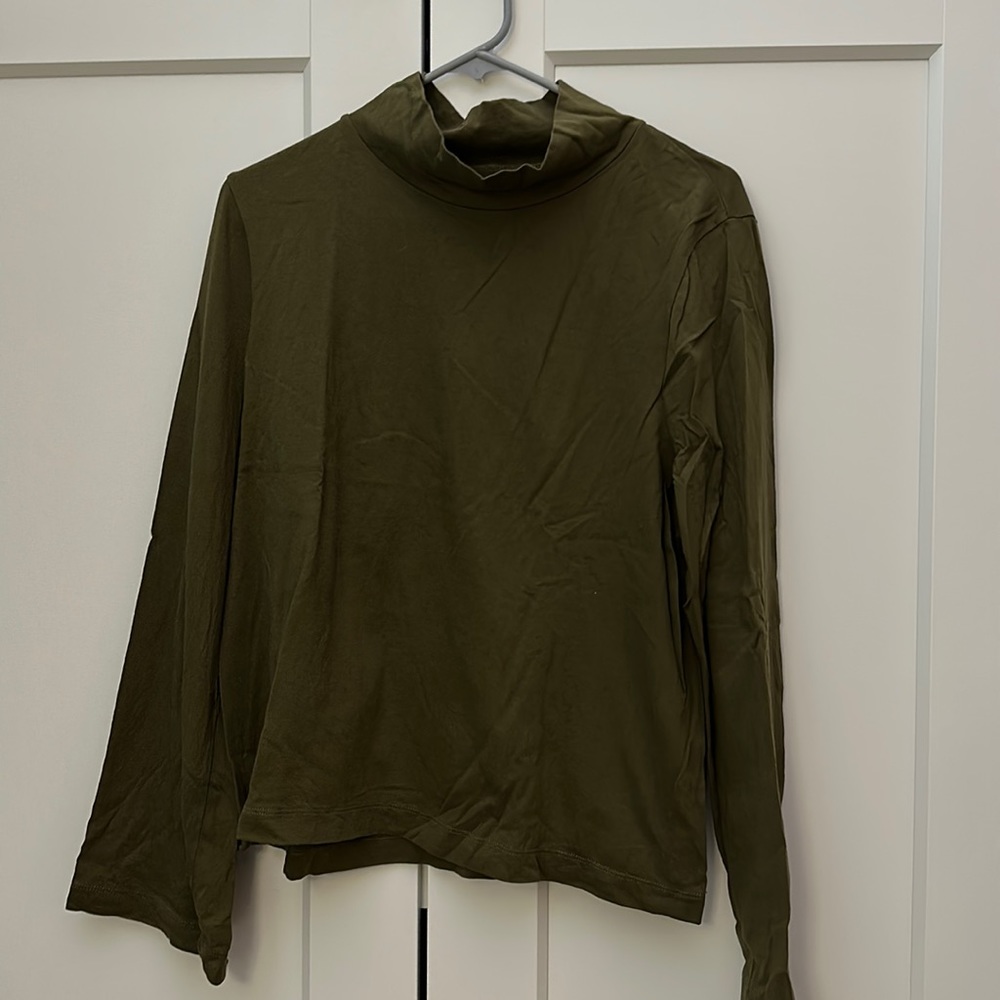 Army green long sleeve Madewell mock neck shirt with bell sleeve